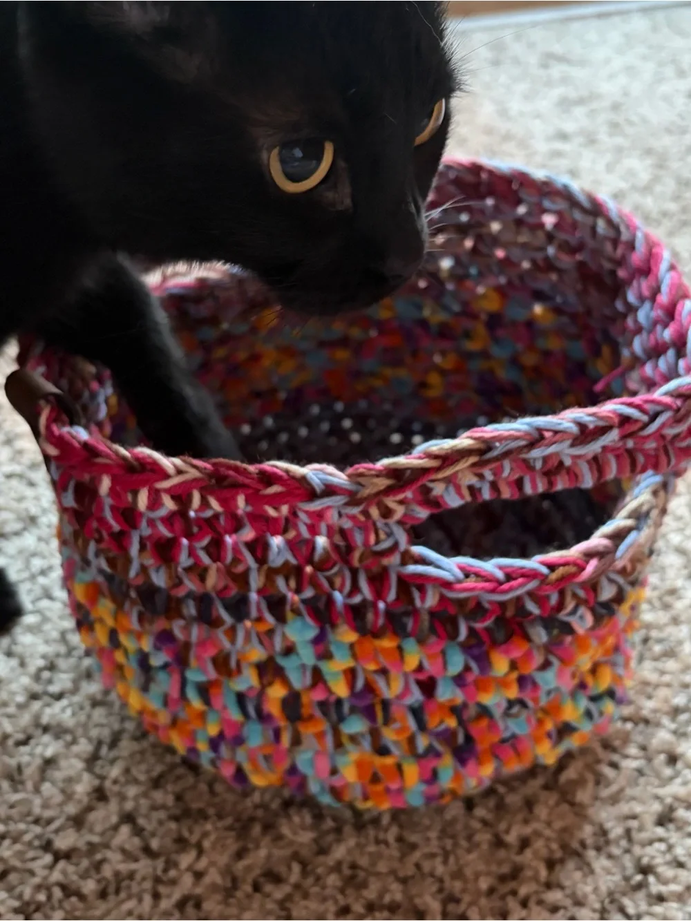 Multicolored crochet scrap basket perfect for storage